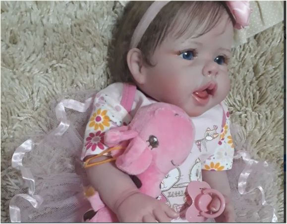 Boneca bebê reborn  toda em  vinil siliconado.
